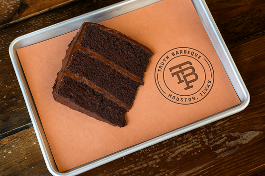 Truth bbq chocolate cake on wooden table