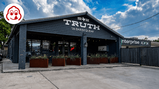 Image of the outside of Truth BBQ with Michelin logo provided by Truth BBQ and posted to Google Business