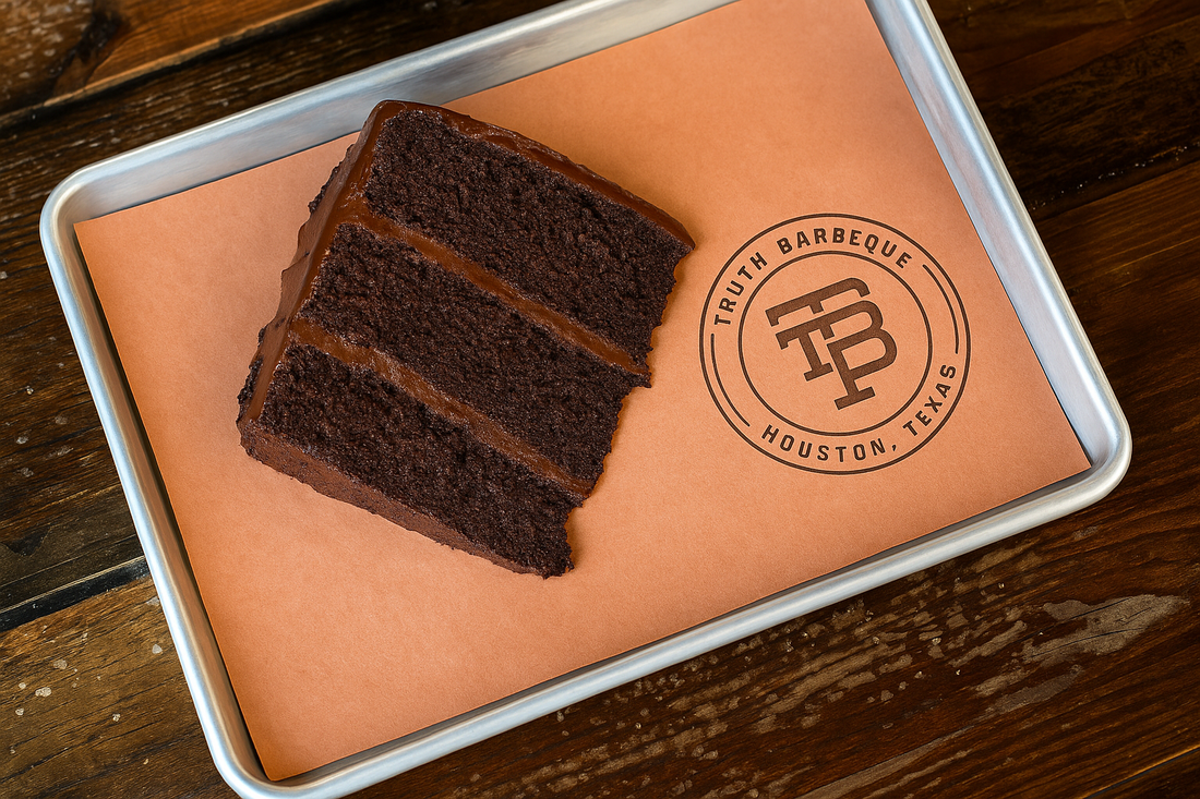 Truth bbq chocolate cake on wooden table