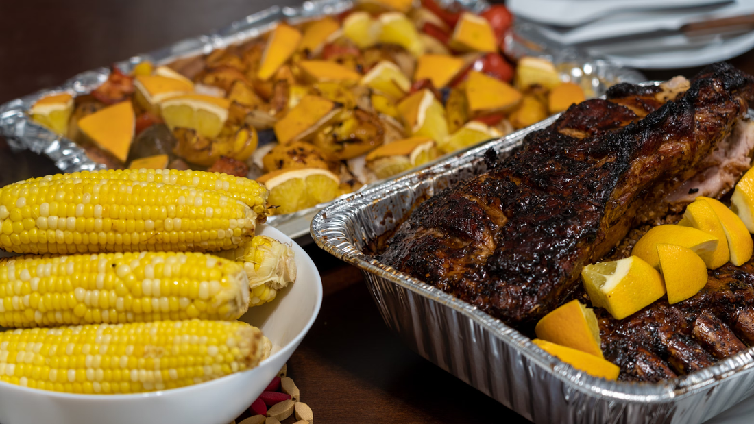 Image of an assortment of food items from Truth BBQ ready for picnic or outdoor cookout. 