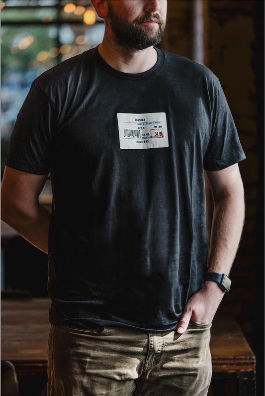 Black graphic tee with a Brisket Scale logo for TRUTH BBQ. 